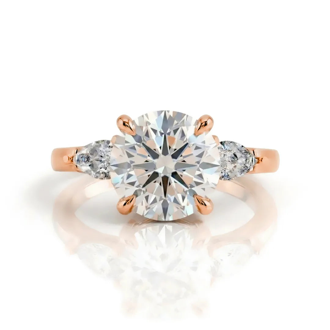 Pear Side Stone Hidden Halo Ring