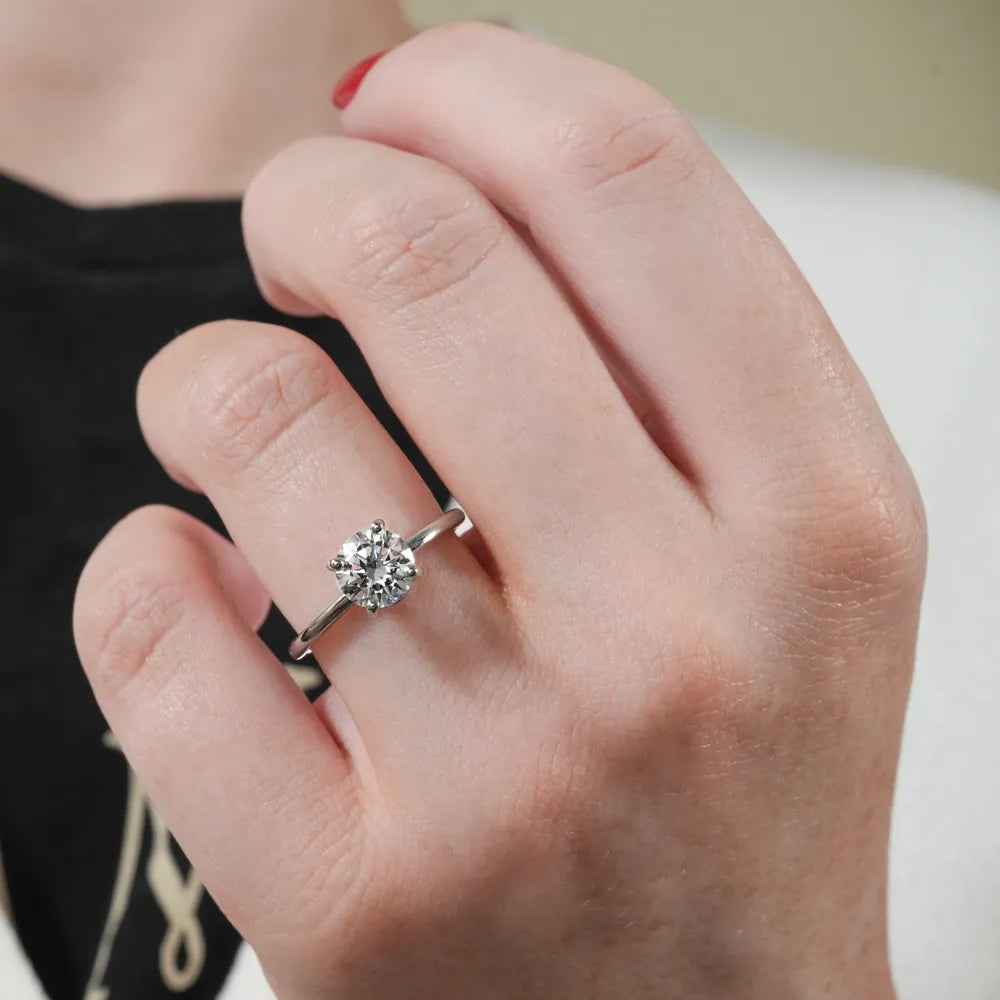 A Thousand Times Dainty Solitaire Engagement Ring