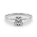 A Thousand Times Dainty Solitaire Engagement Ring