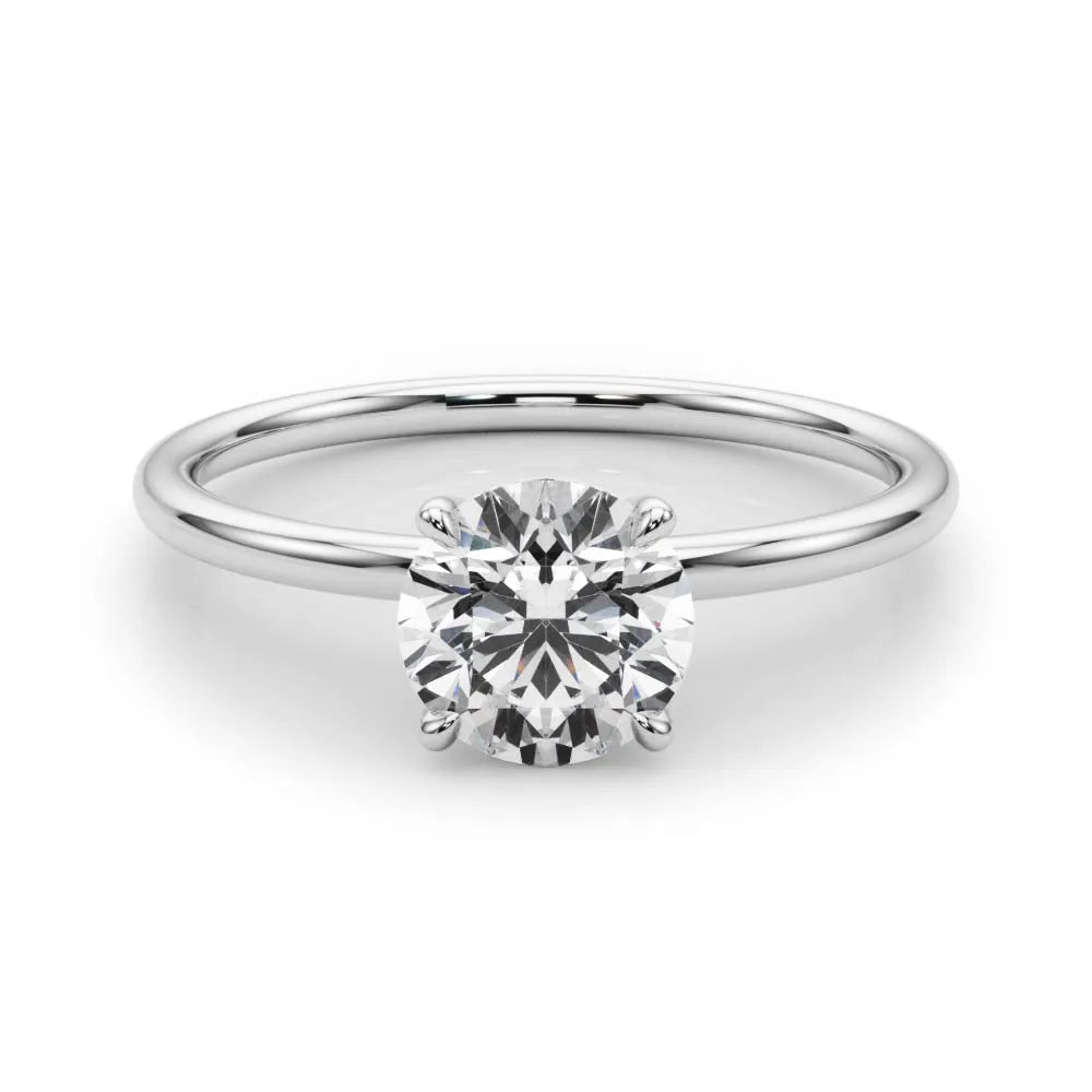 A Thousand Times Dainty Solitaire Engagement Ring